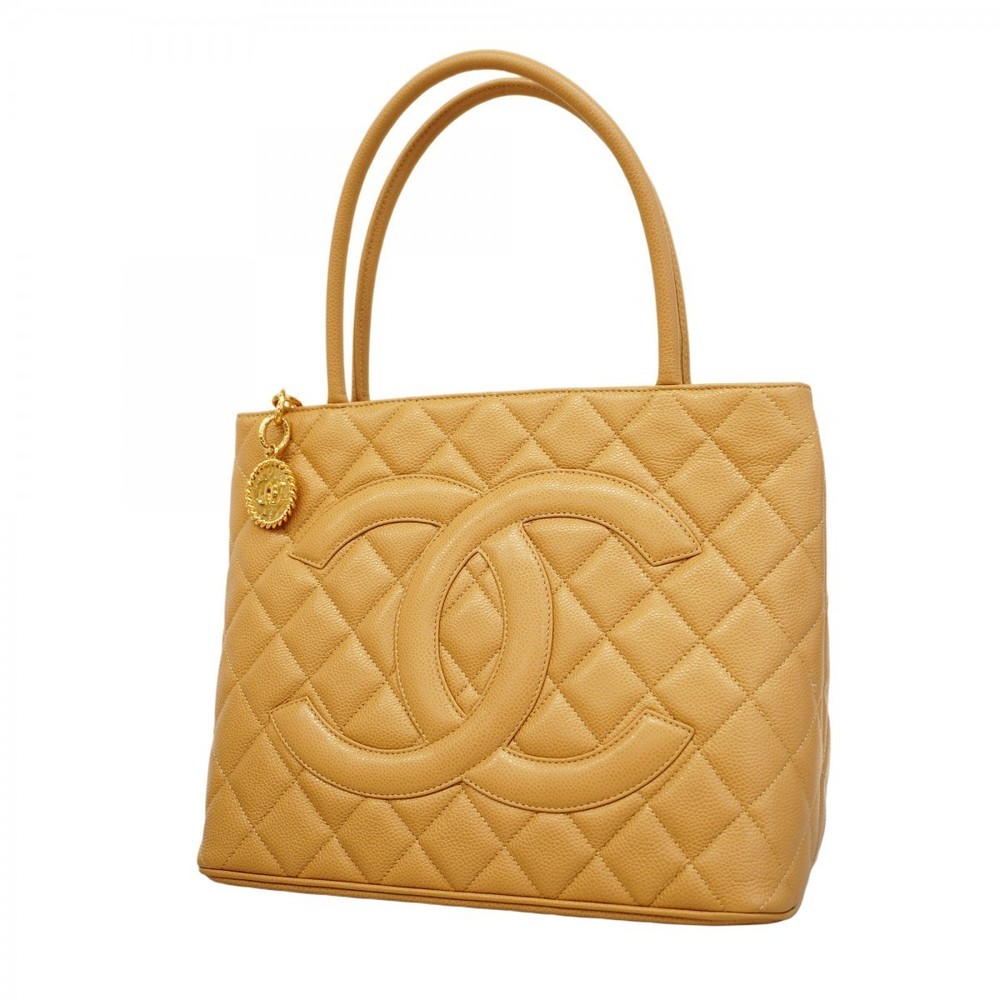 Chanel caviar bag beige tote skin